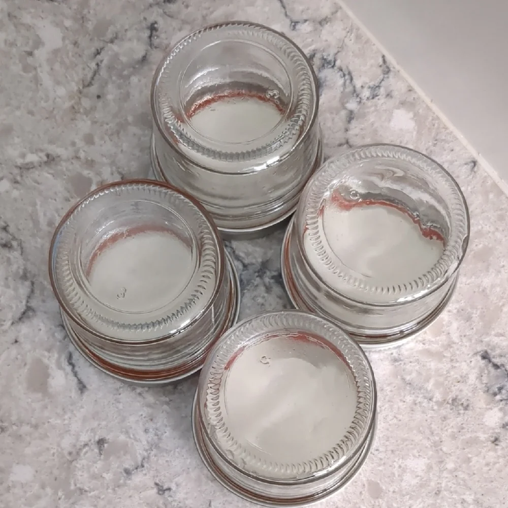 Set of 4 Clear Glass Jars with Silver Lids